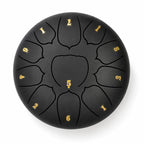 Tongue drum noir de 10 pouces à 11 notes en Ré, en acier, avec un chiffre doré sur chaque languette